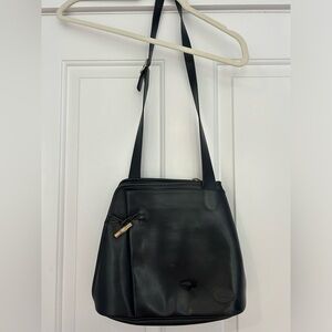 Longchamp Elegant vintage black leather women’s shoulder bag.